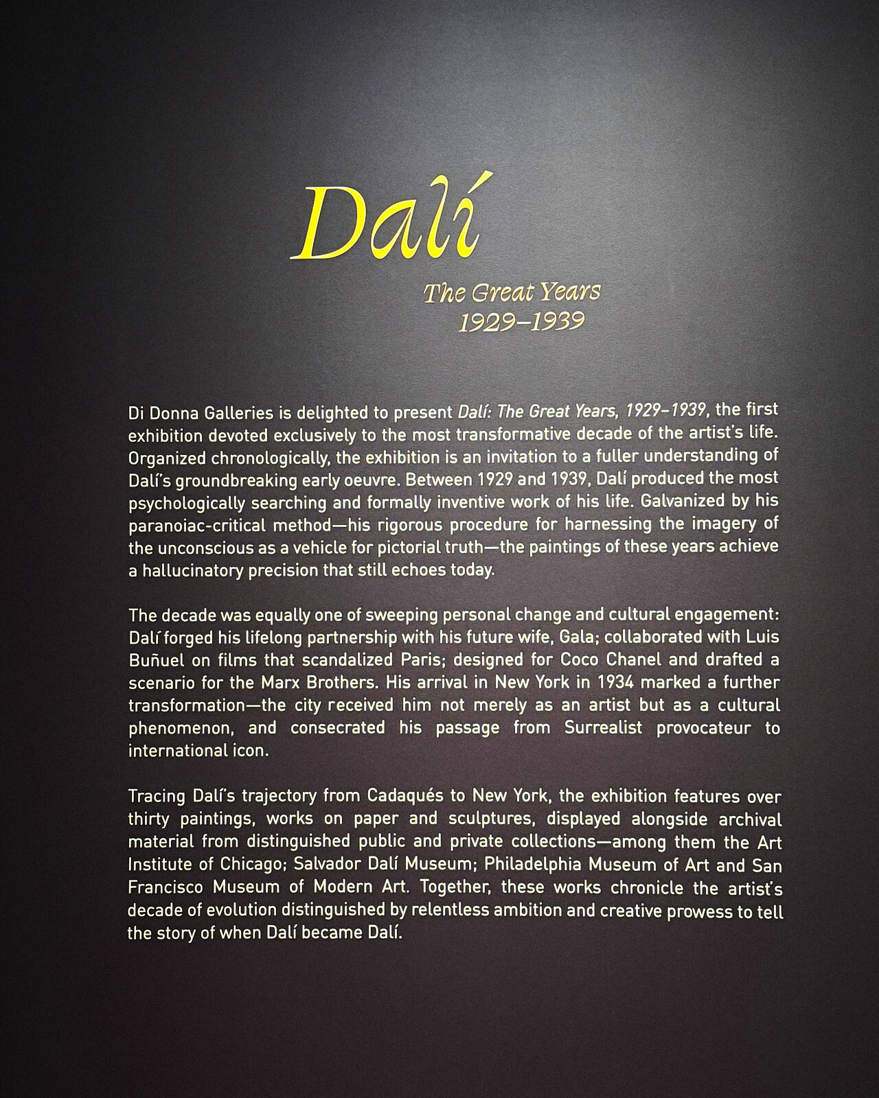 Exhibition title wall didactic text for a Dalí retrospective in a New York gallery